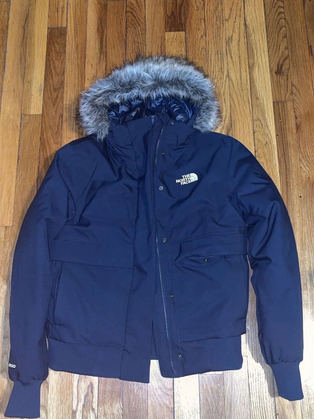 The North Face women’s Navy Puffer Jacket with Faux Fur Trim Hood